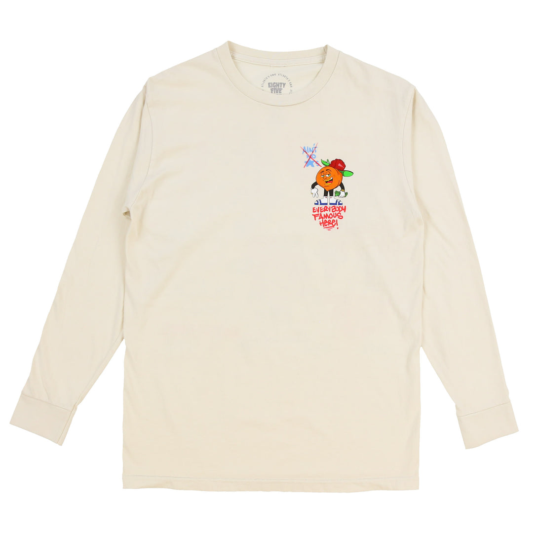 cream colored tee shirt-peach symbol